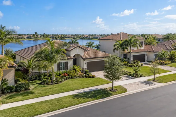 Conceptual view of an established Avalon Park street in Ave Maria with mature landscaping