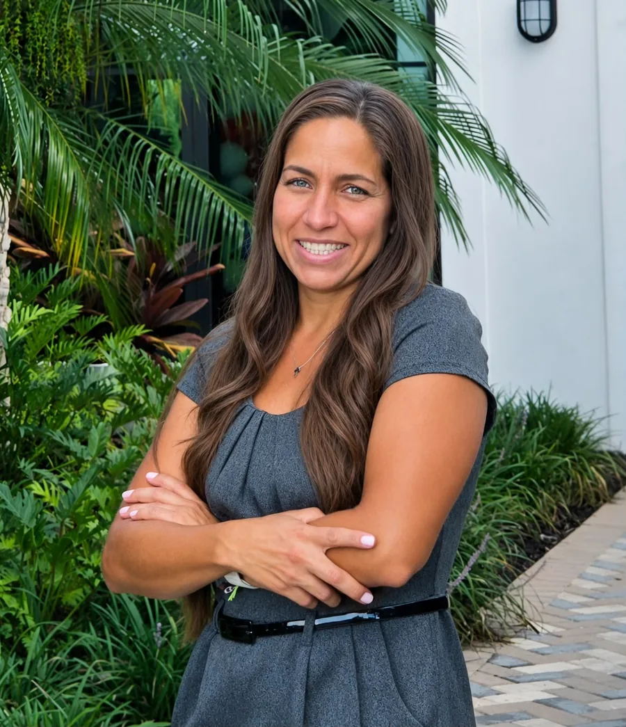 Magaly Moreno, REALTOR with Premiere Plus Realty, smiling outdoors in Naples, Florida