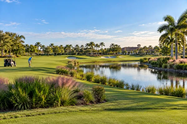 Conceptual view of a golf green and lake at Panther Run Golf Club